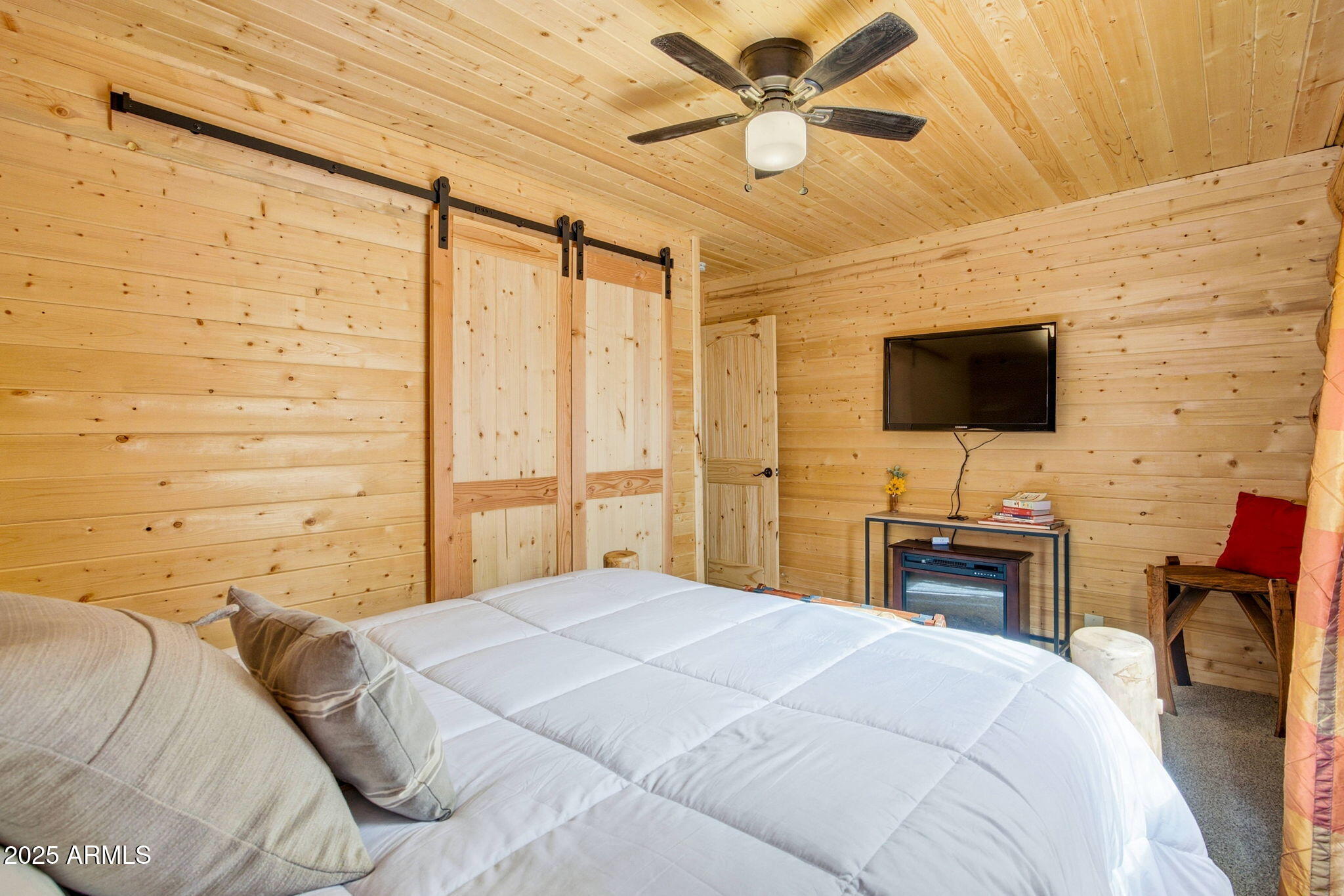 1904 Ponce Place Show Low, AZ 85901 - Photo 17 of 43 a bedroom with a bed window and a flat screen tv