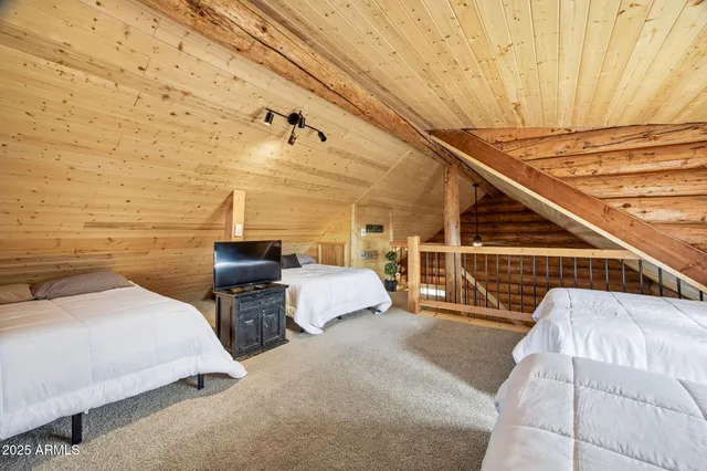 a bedroom with a bed and a walk in closet