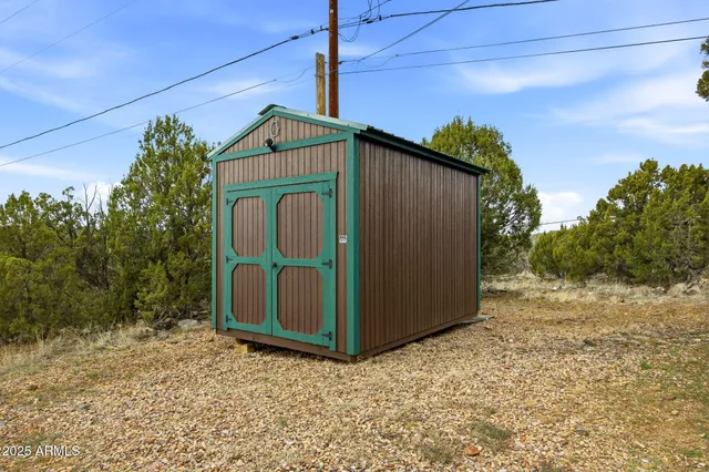 a bedroom with furniture and a wooden floor