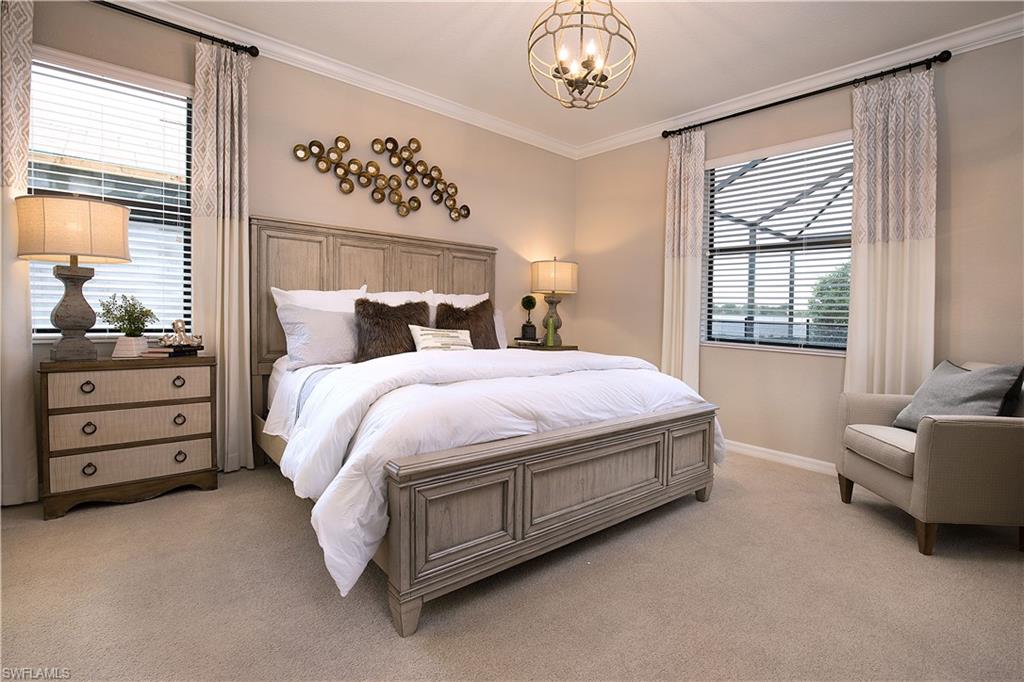 19396 Elston Way Estero, FL 33928 - Photo 5 of 14 a bedroom with a bed and window