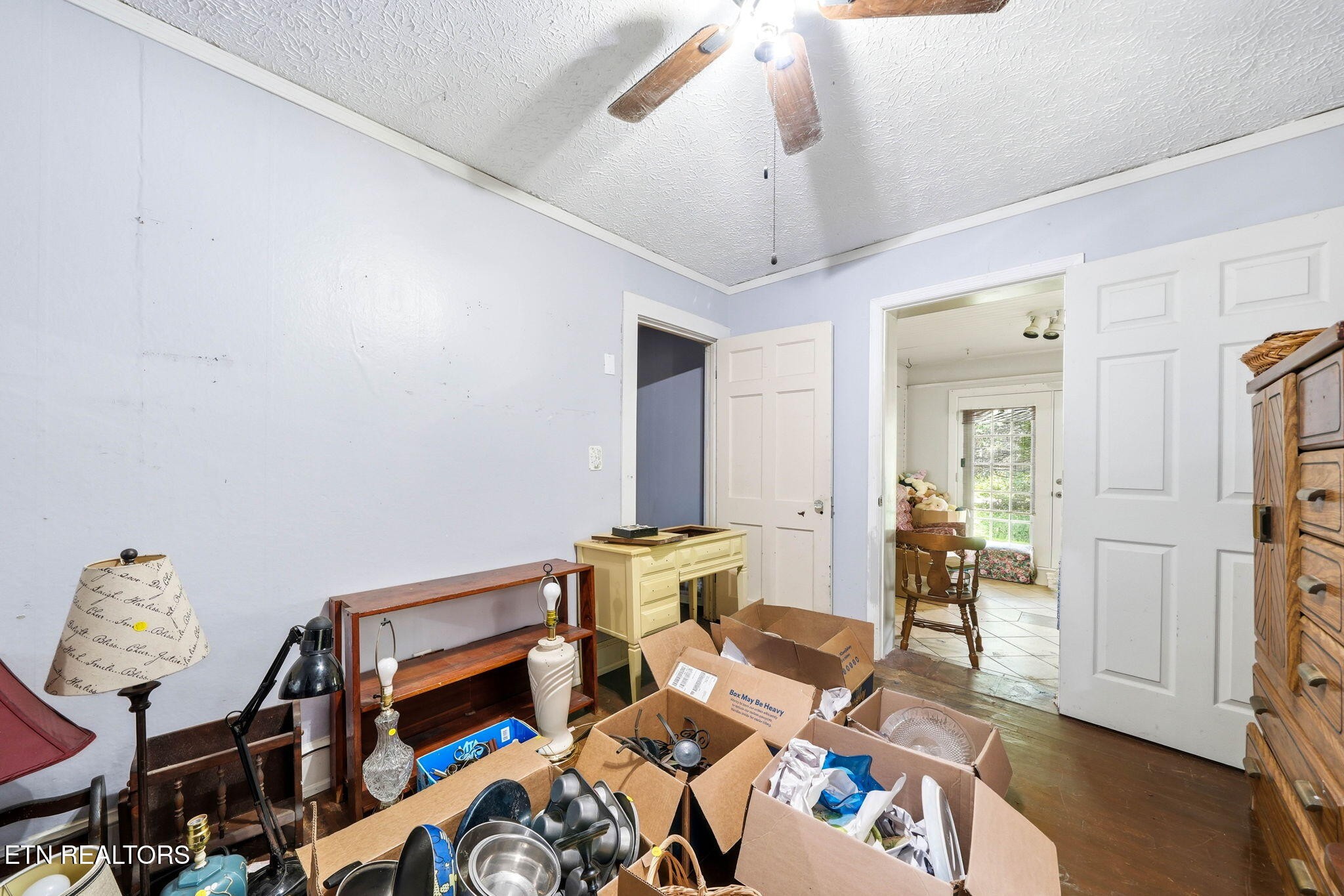 3992 Highway 92 Rutledge, TN 37861 - Photo 26 of 34 a bedroom with furniture and a chandelier fan