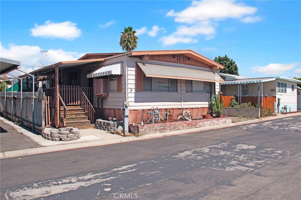 a front view of a house with yard