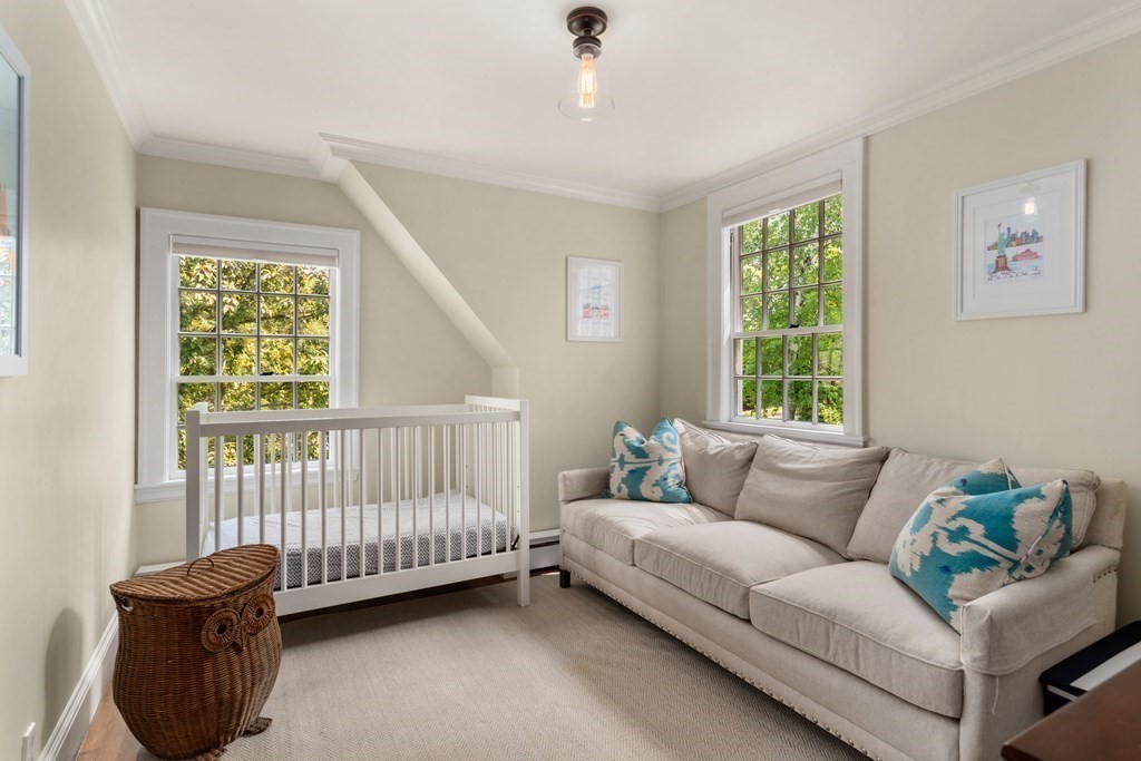 176 Dorset Road Newton, MA 02468 - Photo 22 of 27 a living room with furniture and a window