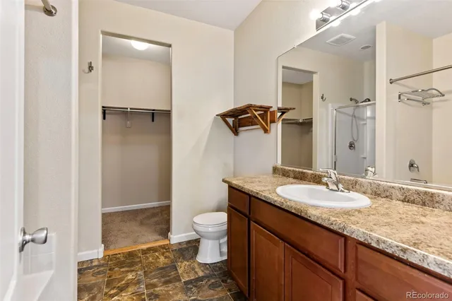 a view of a swimming pool with an outdoor space and seating area