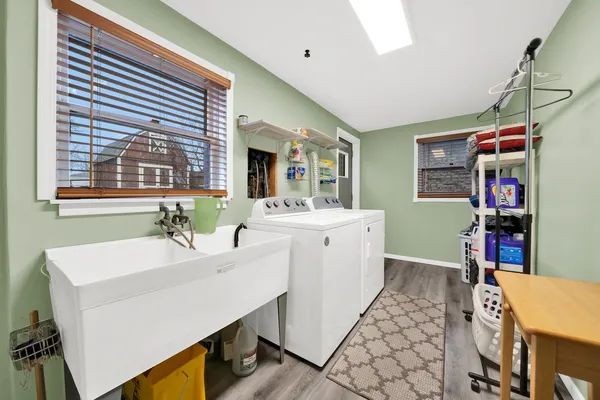 a bathroom with a sink a vanity and a mirror