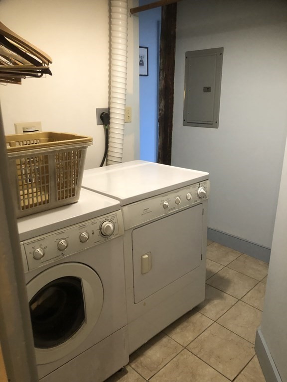 55 Park Street Boston, MA 02129 - Photo 14 of 24 a utility room with washer and dryer