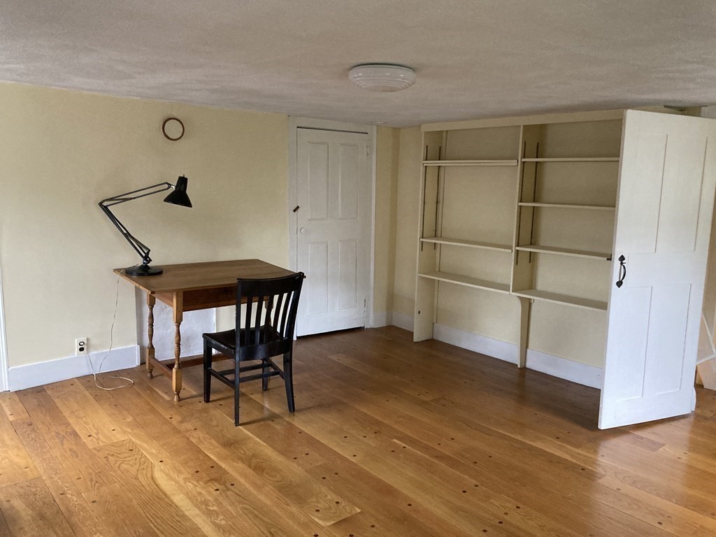 55 Park Street Boston, MA 02129 - Photo 18 of 24 a view of a room with wooden floor and windows