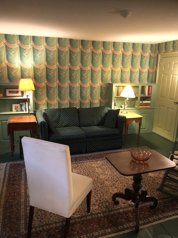 55 Park Street Boston, MA 02129 - Photo 4 of 24 a living room with furniture and lamp