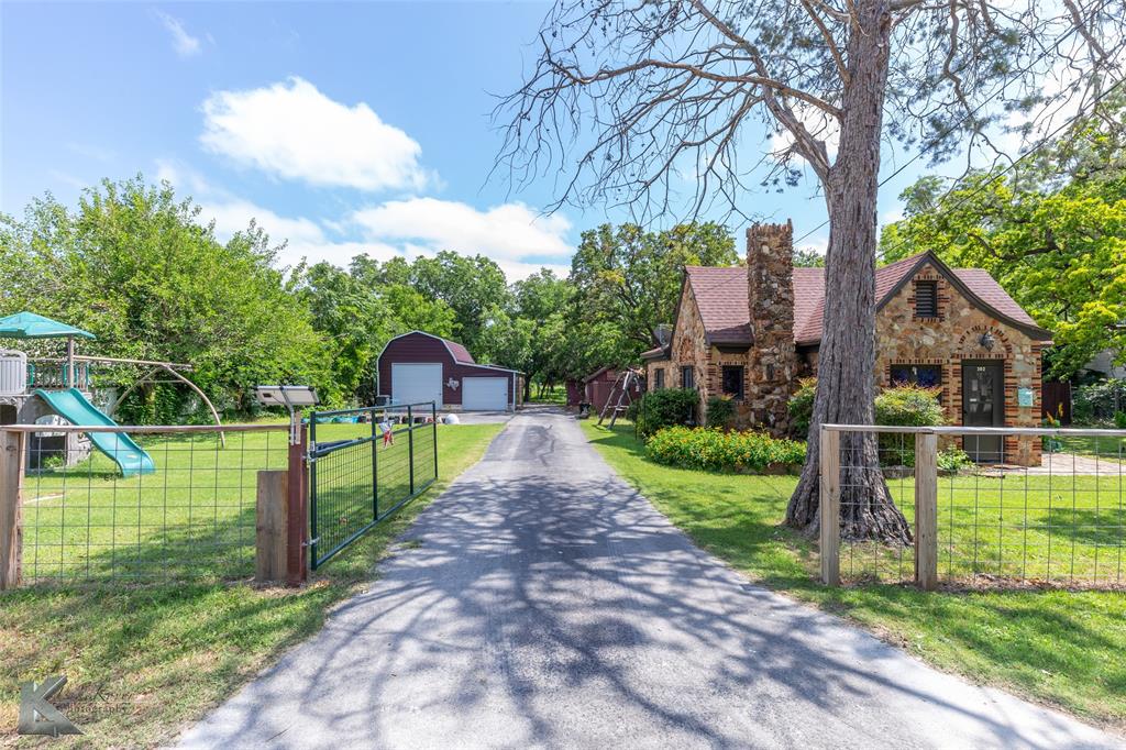 202 East Ross Street Rising Star, TX 76471 - Photo 2 of 40 a view of a park with large trees