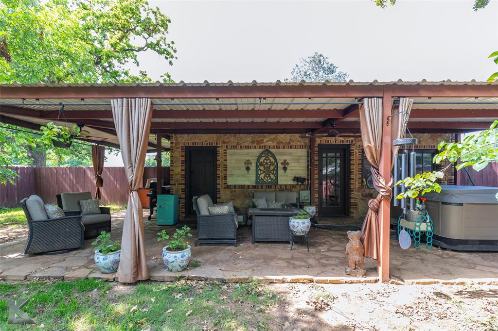 202 East Ross Street Rising Star, TX 76471 - Photo 36 of 40 a front view of a house with garden
