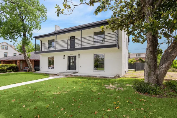 a house view with a garden space