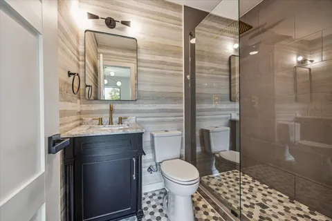 a bathroom with a sink and mirror