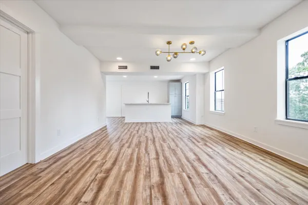 a view of an empty room and window