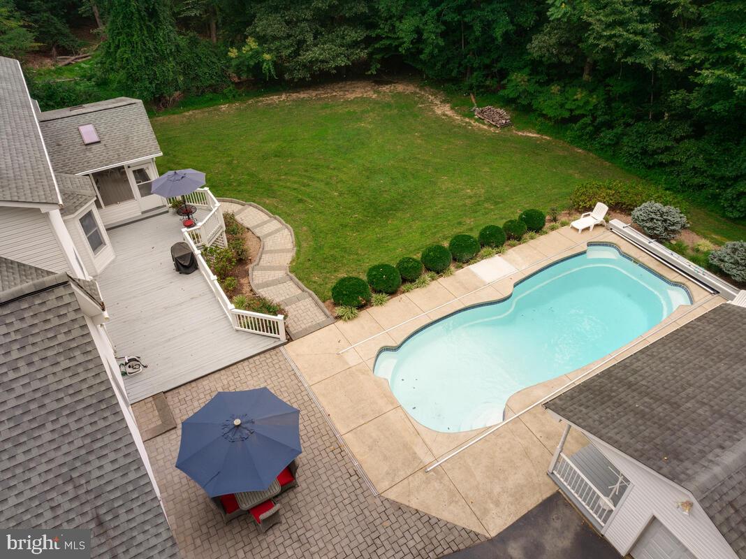 3897 Hunting Creek Road Huntingtown, MD 20639 - Photo 68 of 75 an aerial view of a house having swimming pool having outdoor seating