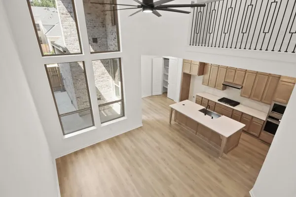 a bedroom with bed and a window
