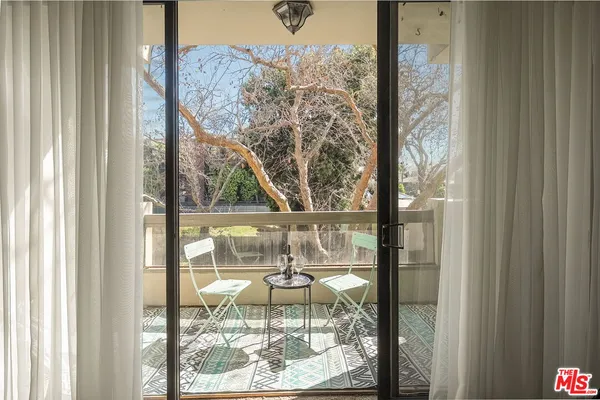 a view of a balcony from a room