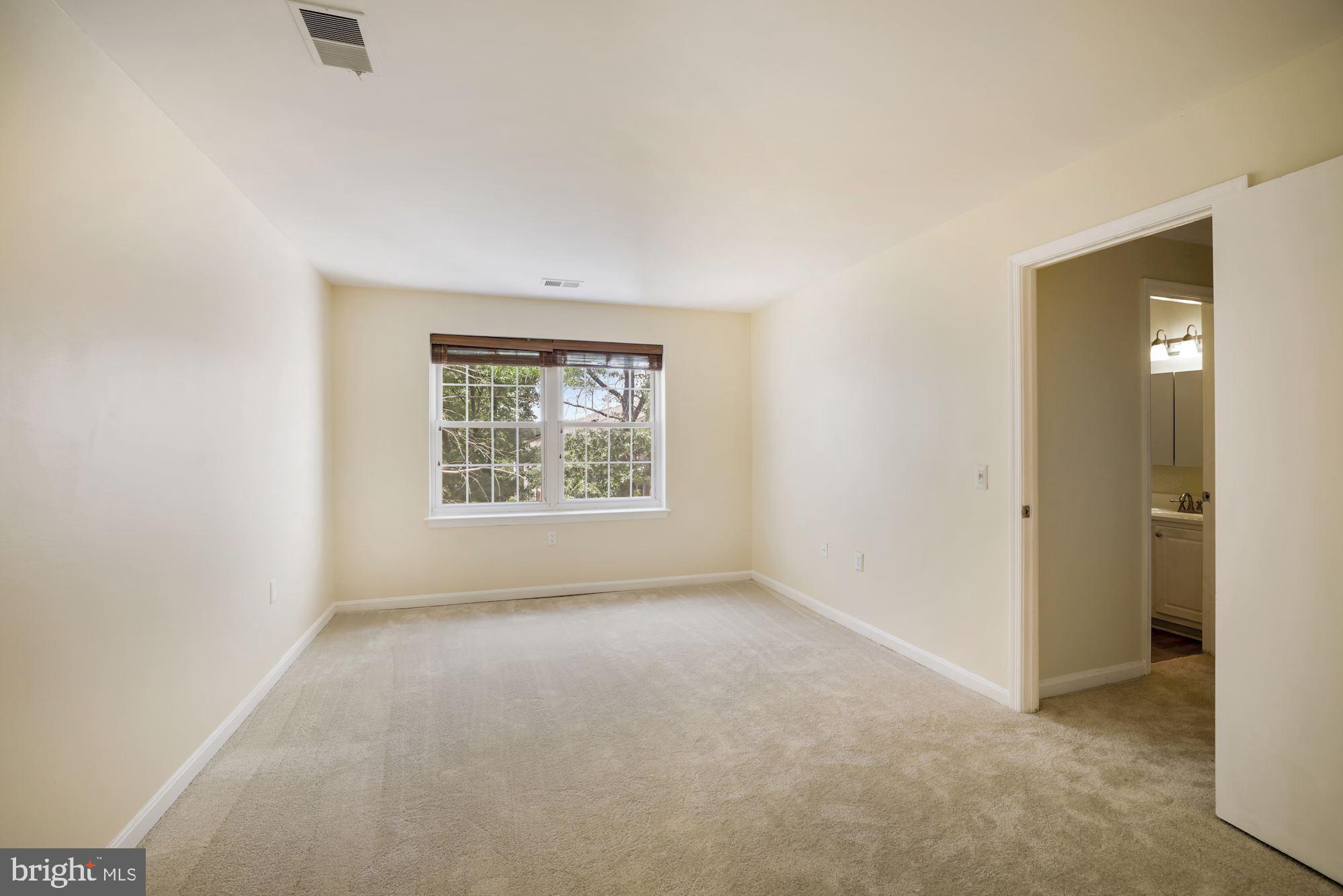 18318 Streamside Drive, Unit 302 Gaithersburg, MD 20879 - Photo 13 of 22 Master Bedroom