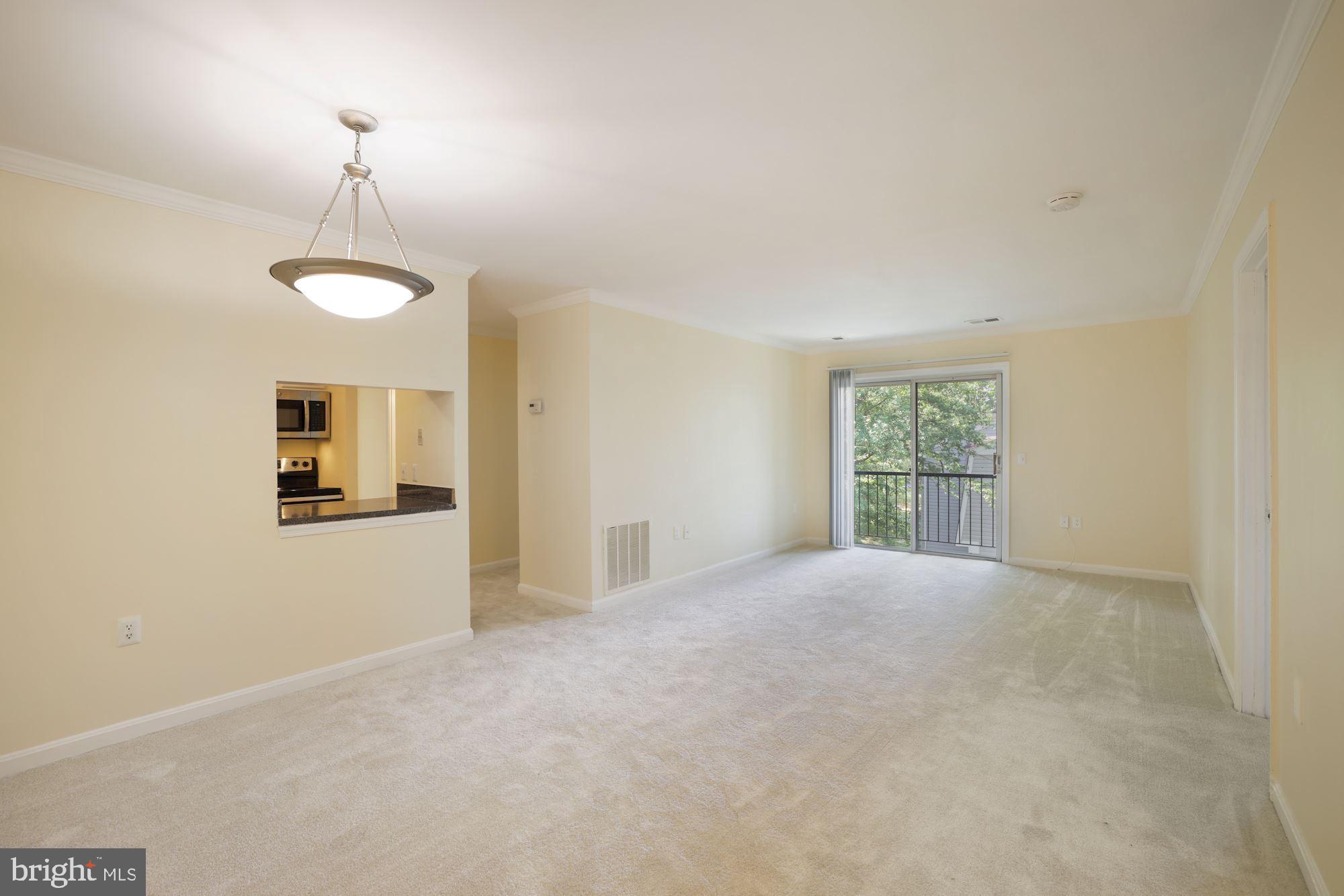 18318 Streamside Drive, Unit 302 Gaithersburg, MD 20879 - Photo 9 of 22 Dinning Area and Living Room