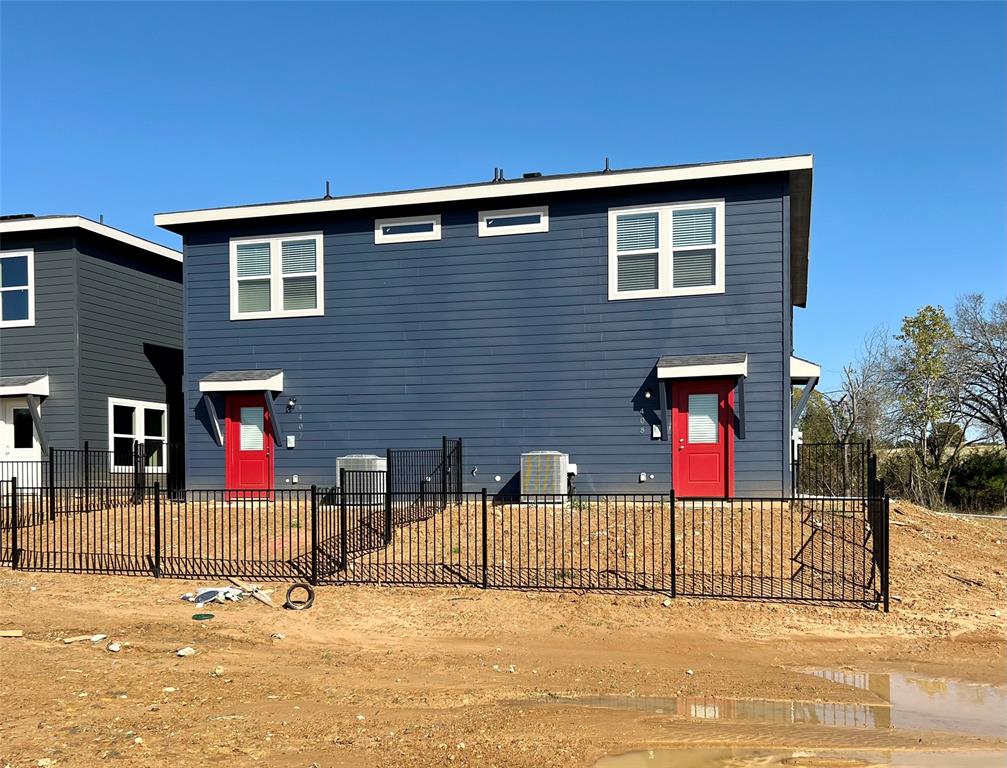 3501 East Renfro Street, Unit 408 Burleson, TX 76028 - Photo 1 of 35 a front view of a house with a street