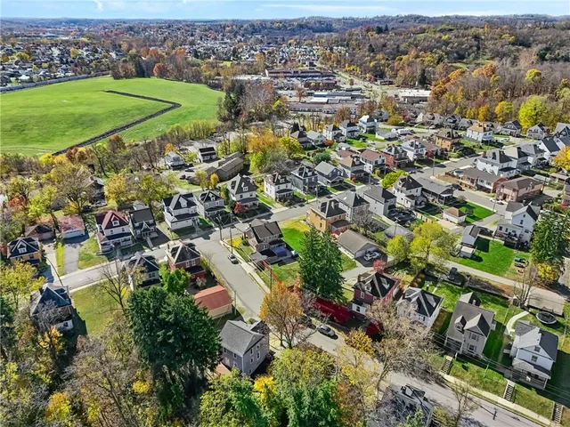 an aerial view of a city with lots of residential buildings