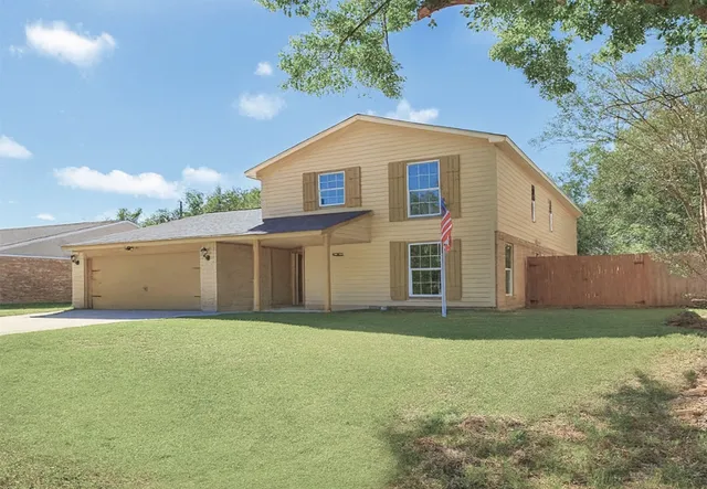 a house view with a outdoor space