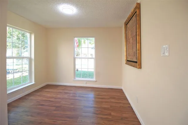 an empty room with windows