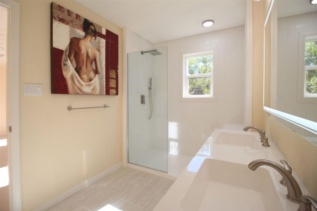 8011 Goldengrove Drive Spring, TX 77379 - Photo 28 of 48 a bathroom with a bathtub and shower