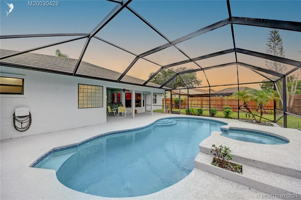 2126 Southeast Dolphin Road Port St. Lucie, FL 34952 - Photo 4 of 30 a view of a indoor swimming pool