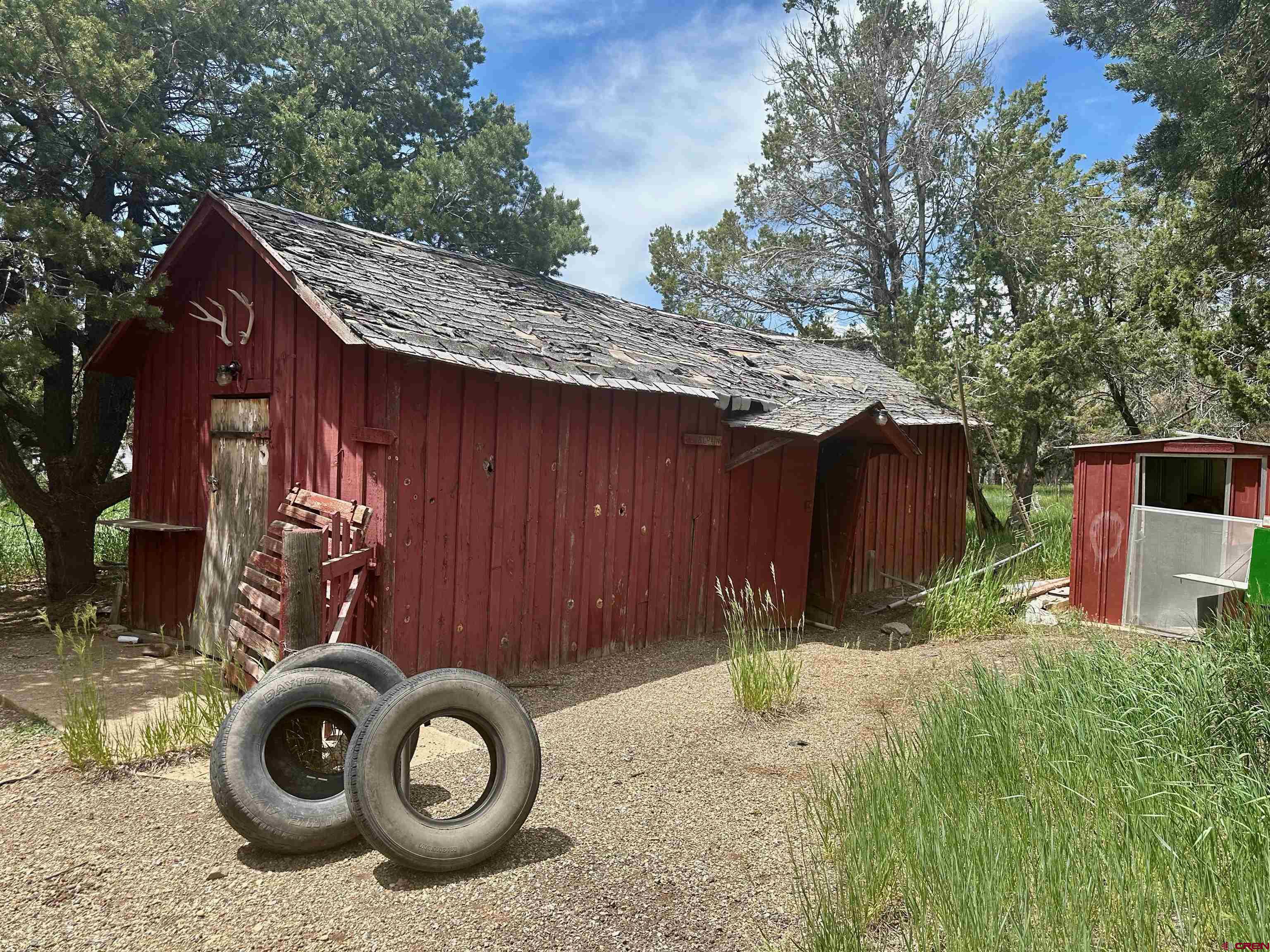 41559 Road H 25 Mancos Co 81328 Mancos, CO 81328 - Photo 15 of 20 a front view of a house with garden