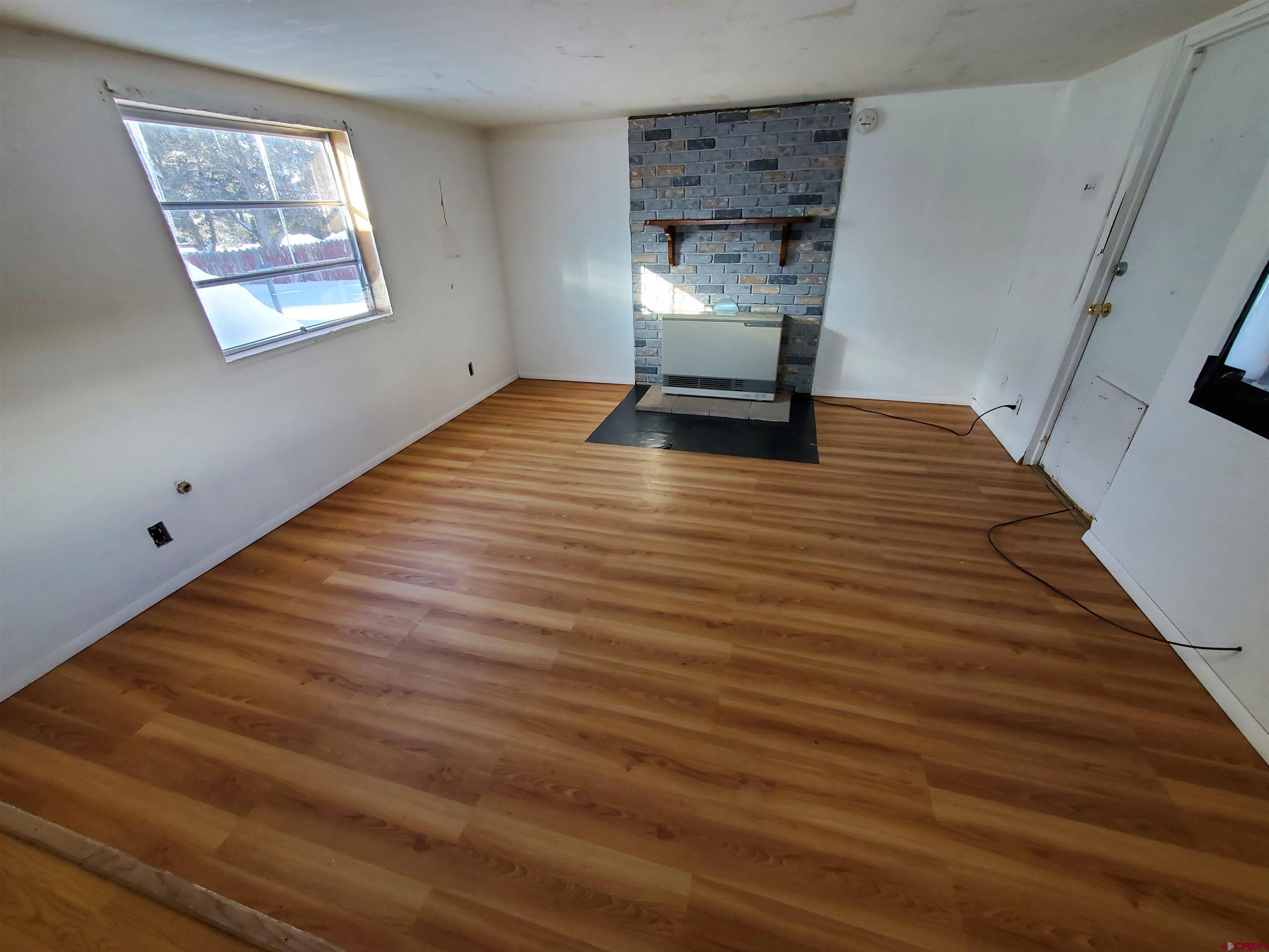 41559 Road H 25 Mancos Co 81328 Mancos, CO 81328 - Photo 6 of 20 a view of an empty room with a window