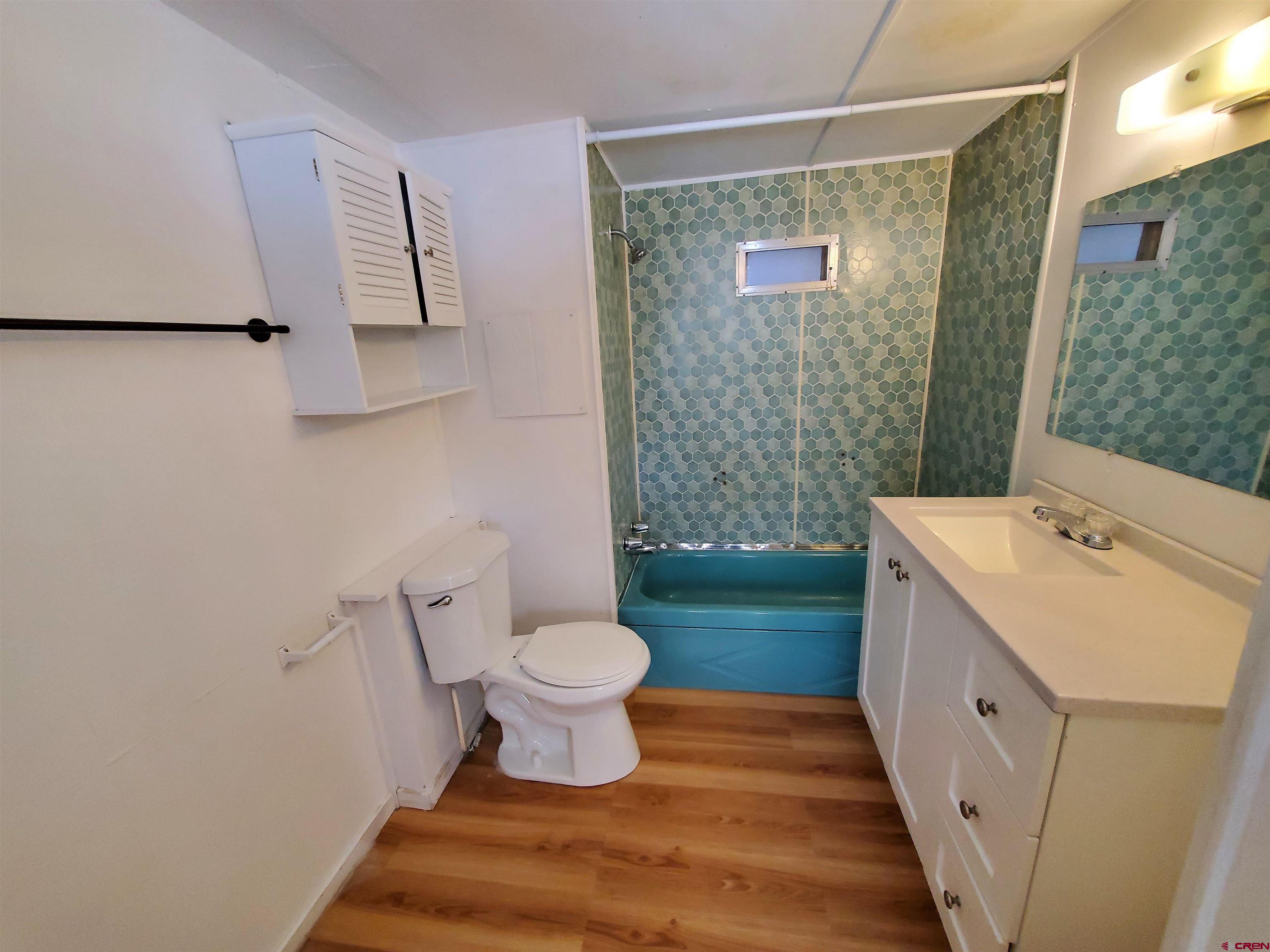 41559 Road H 25 Mancos Co 81328 Mancos, CO 81328 - Photo 8 of 20 a bathroom with a sink and a mirror