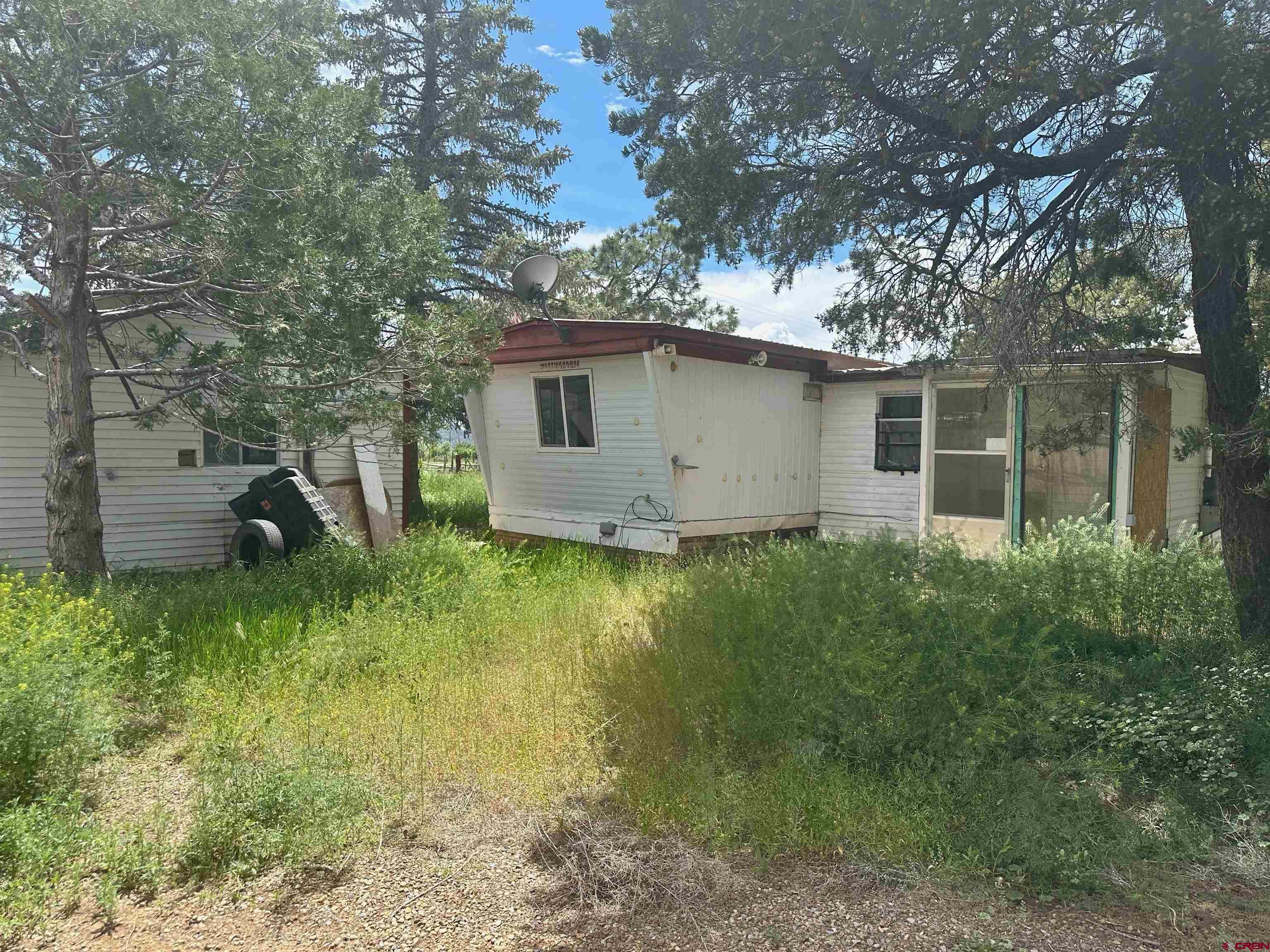 41559 Road H 25 Mancos Co 81328 Mancos, CO 81328 - Photo 10 of 20 a view of a house with a yard