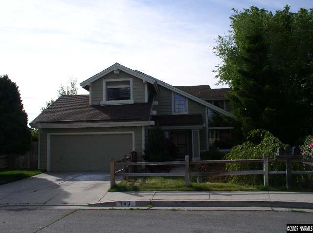 140 Riverhaven Place Reno, NV 89519 - Photo 3 of 6 a front view of a house with a garden