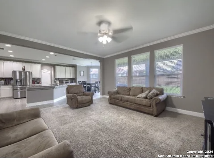 7566 Copper Cove Converse, TX 78109 - Photo 6 of 22 a living room with furniture and a large window