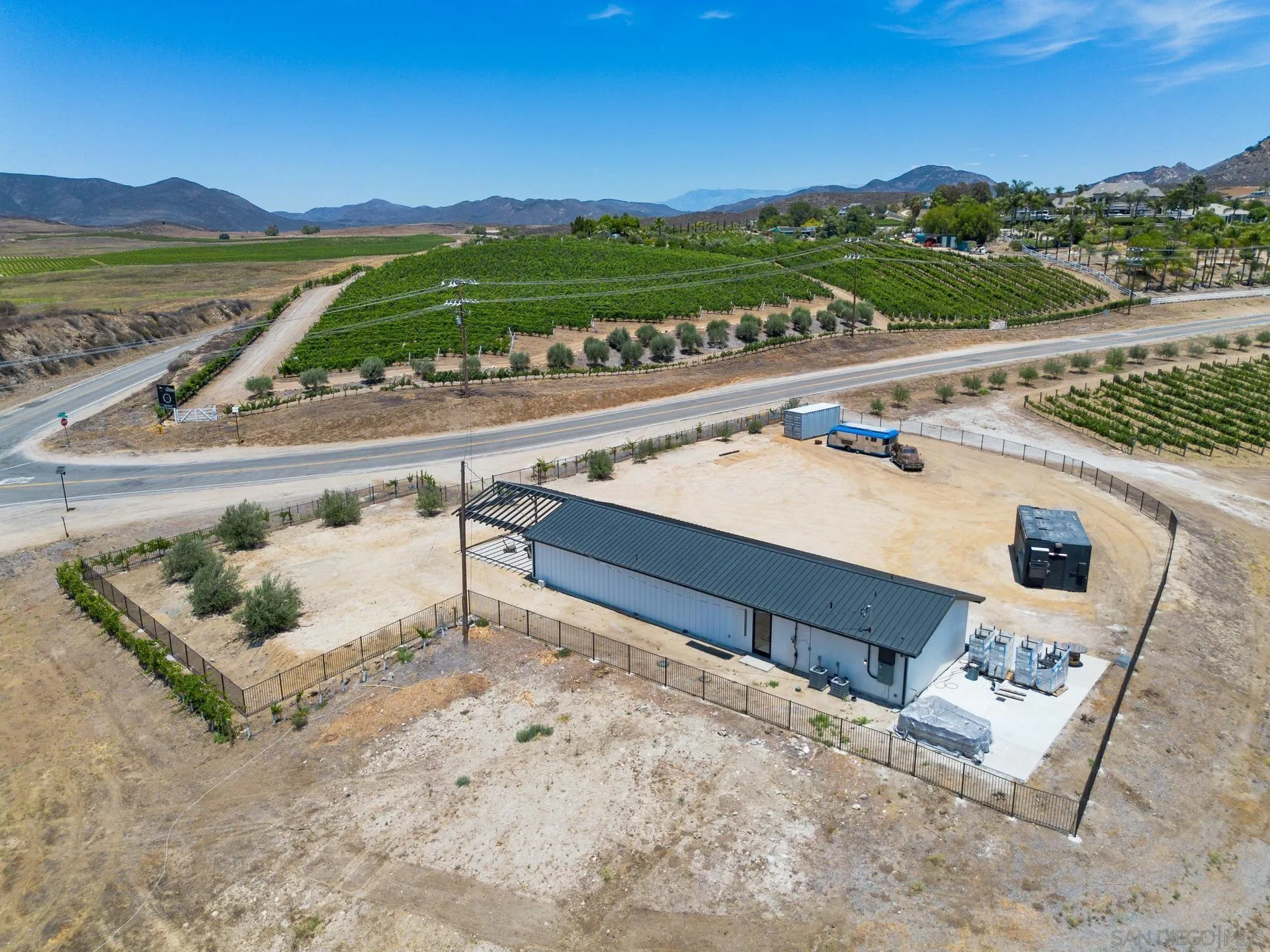 36051 East Benton Road, Unit 1 Temecula, CA 92592 - Photo 25 of 42 a view of a terrace with wooden floor and a terrace view