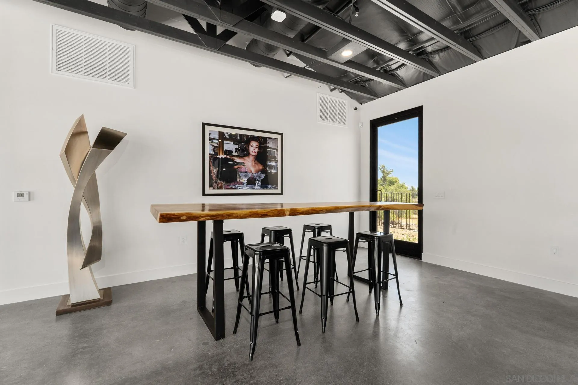 36051 East Benton Road, Unit 1 Temecula, CA 92592 - Photo 30 of 42 a dining room with furniture and wooden floor