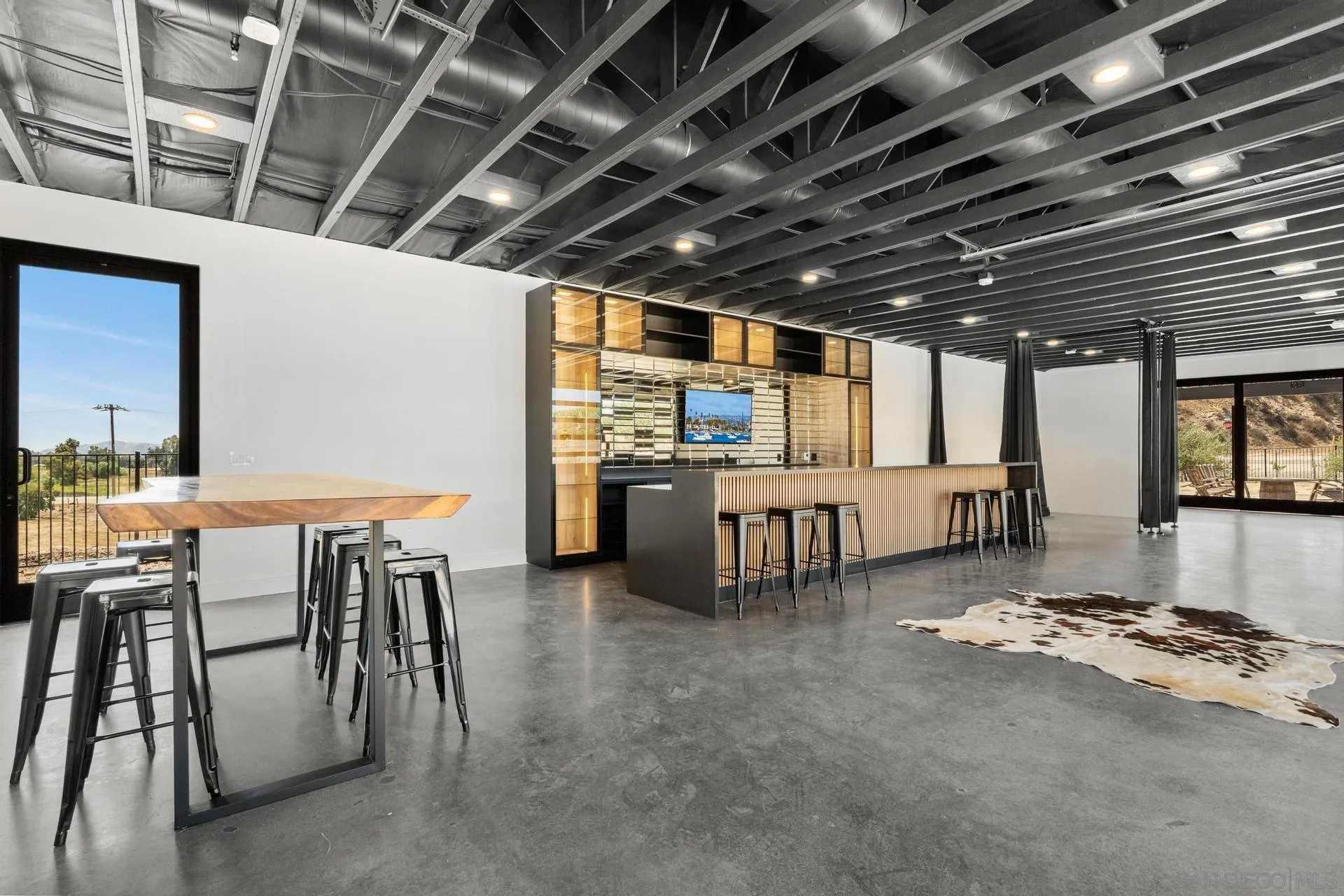 36051 East Benton Road, Unit 1 Temecula, CA 92592 - Photo 32 of 42 a view of a chairs and table in a room