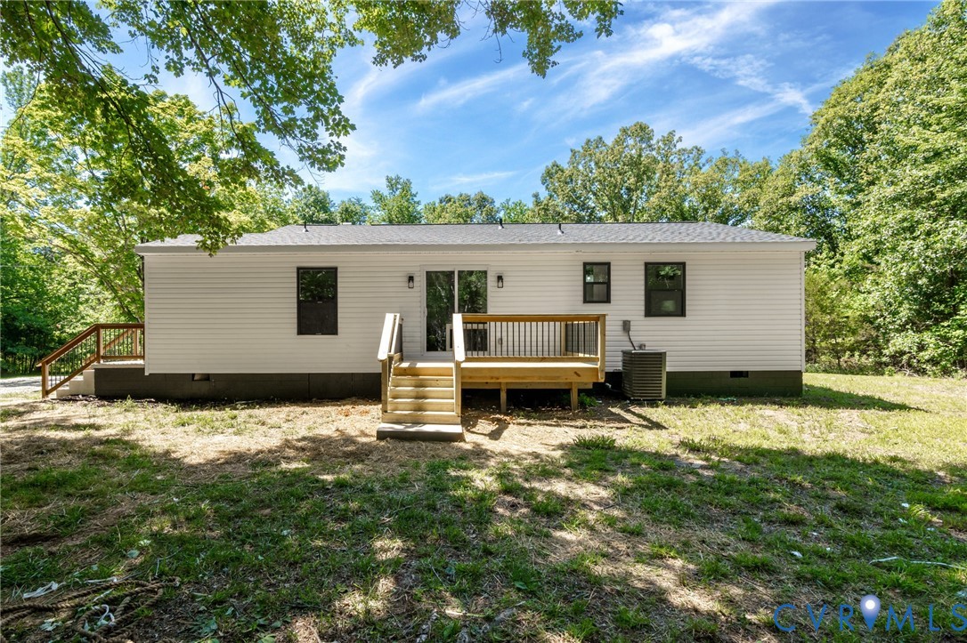 3056 Davis Mill Road Goochland, VA 23063 - Photo 43 of 46 Rear exterior featuring white vinyl siding, a dark