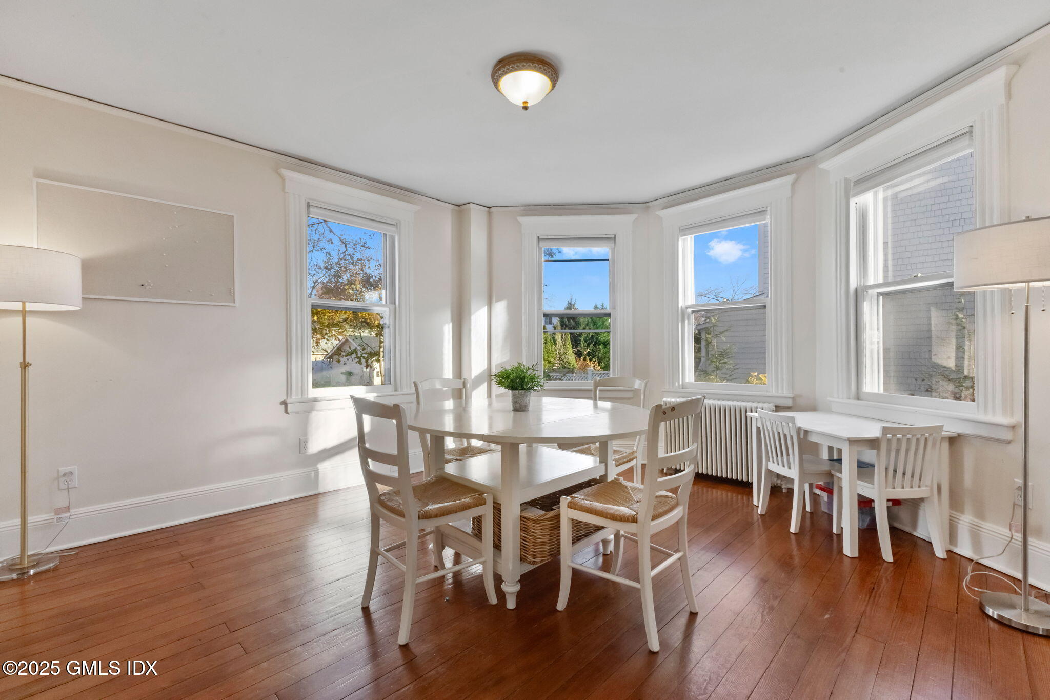 27 Sinawoy Road Cos Cob, CT 06807 - Photo 6 of 13 a view of a dining room with furniture and wooden floor