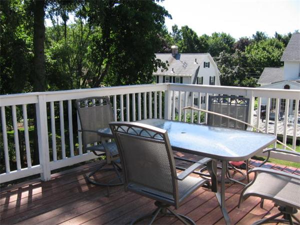 6 Lyndale Road Worcester, MA 01606 - Photo 20 of 21 a balcony with table and chairs