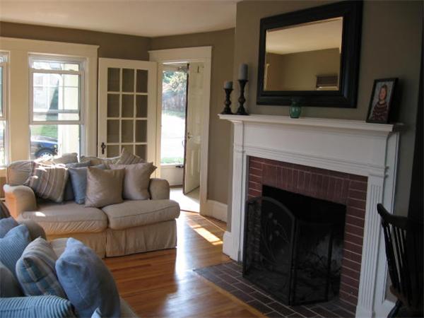 6 Lyndale Road Worcester, MA 01606 - Photo 7 of 21 a living room with furniture a flat screen tv and a fireplace