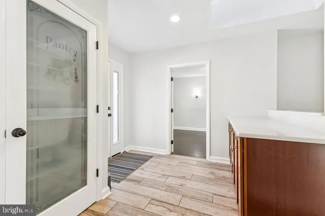 a bathroom with a sink and a shower