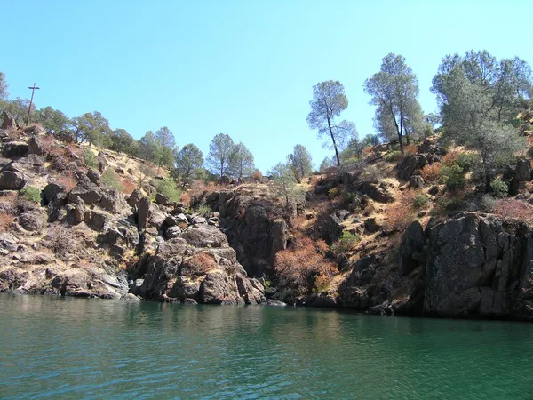 a view of lake with mountain in the background