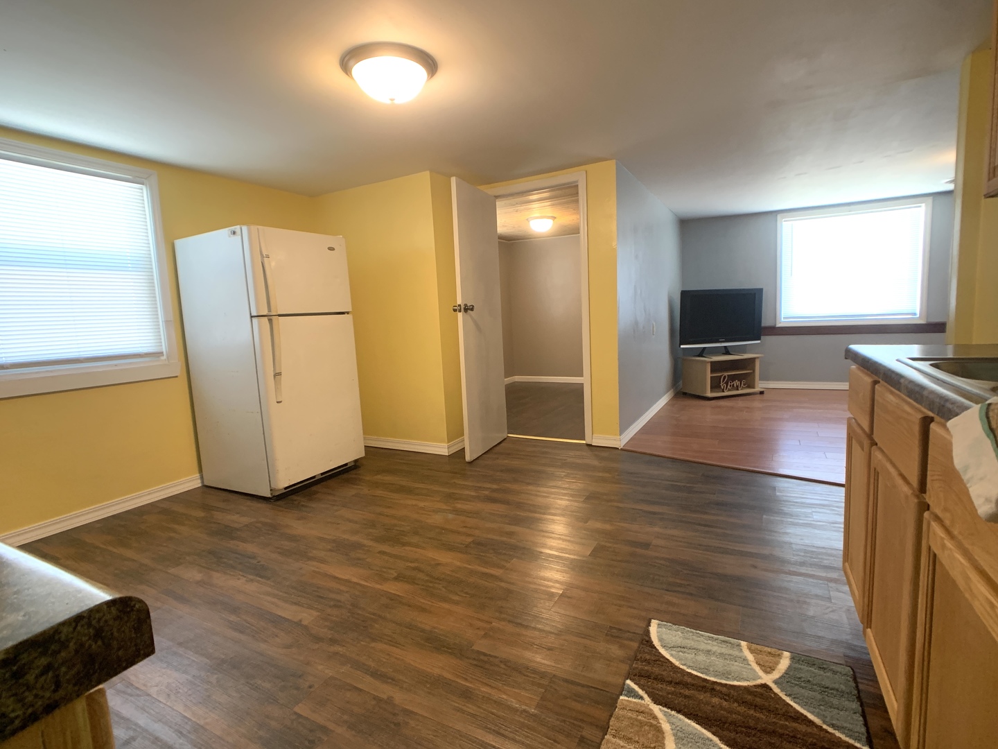 205 West 7th Street Spring Valley, IL 61362 - Photo 18 of 34 a view of a kitchen with furniture and wooden floor