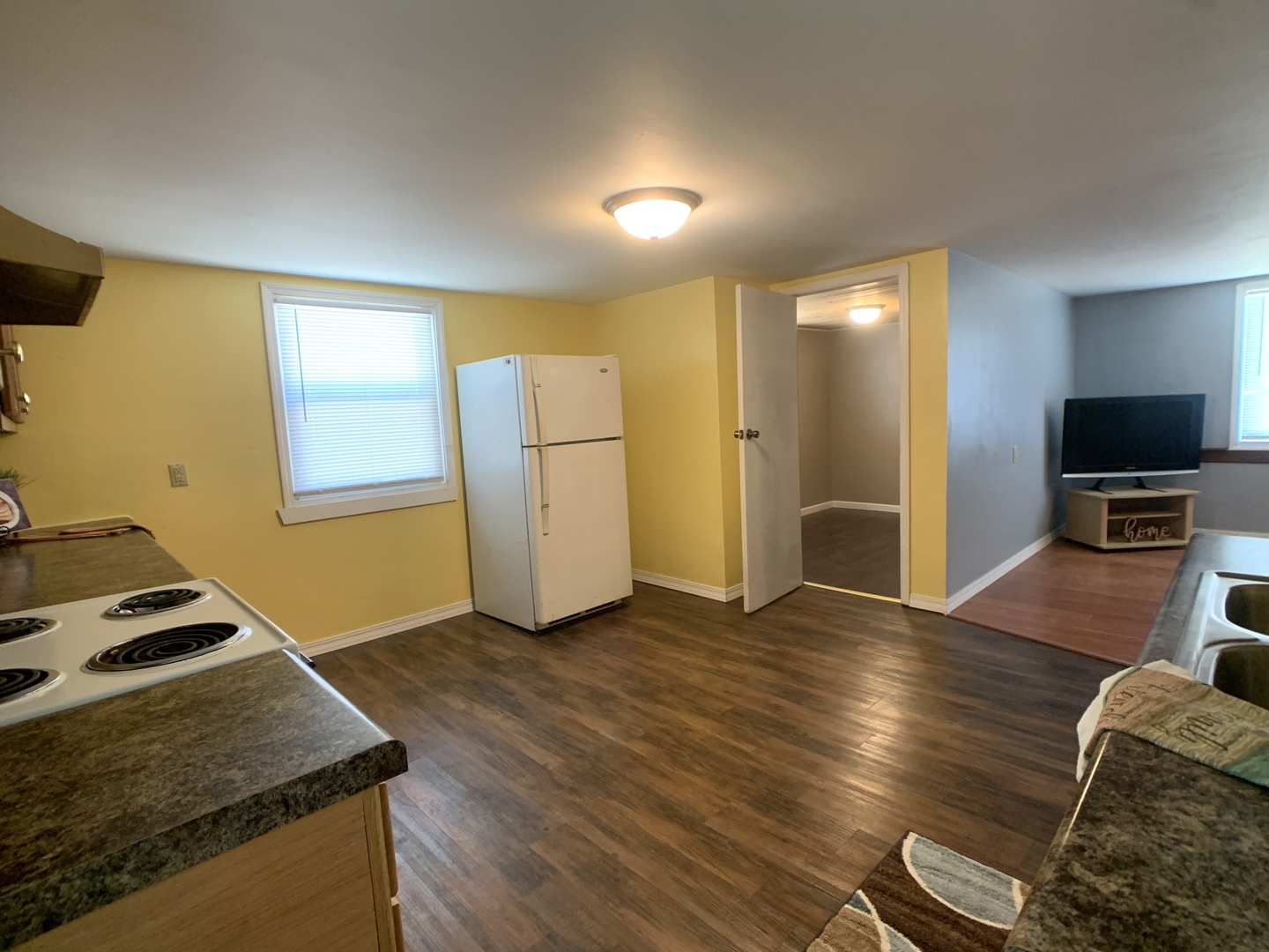 205 West 7th Street Spring Valley, IL 61362 - Photo 19 of 34 a view of kitchen with furniture and wooden floor
