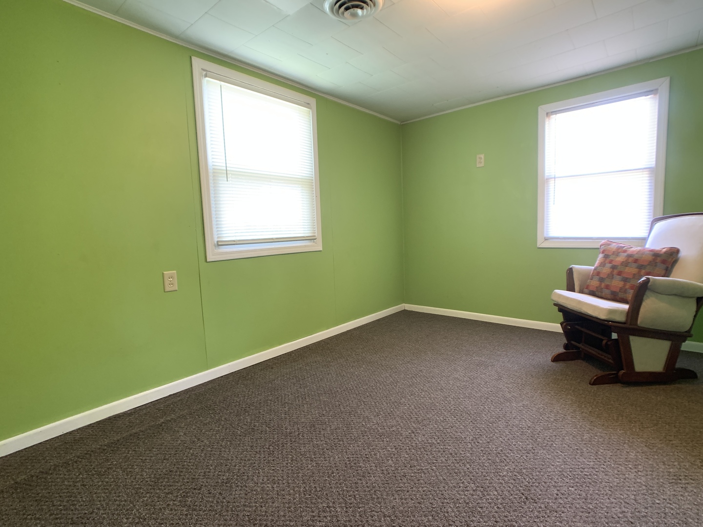205 West 7th Street Spring Valley, IL 61362 - Photo 28 of 34 a room with a window and chair