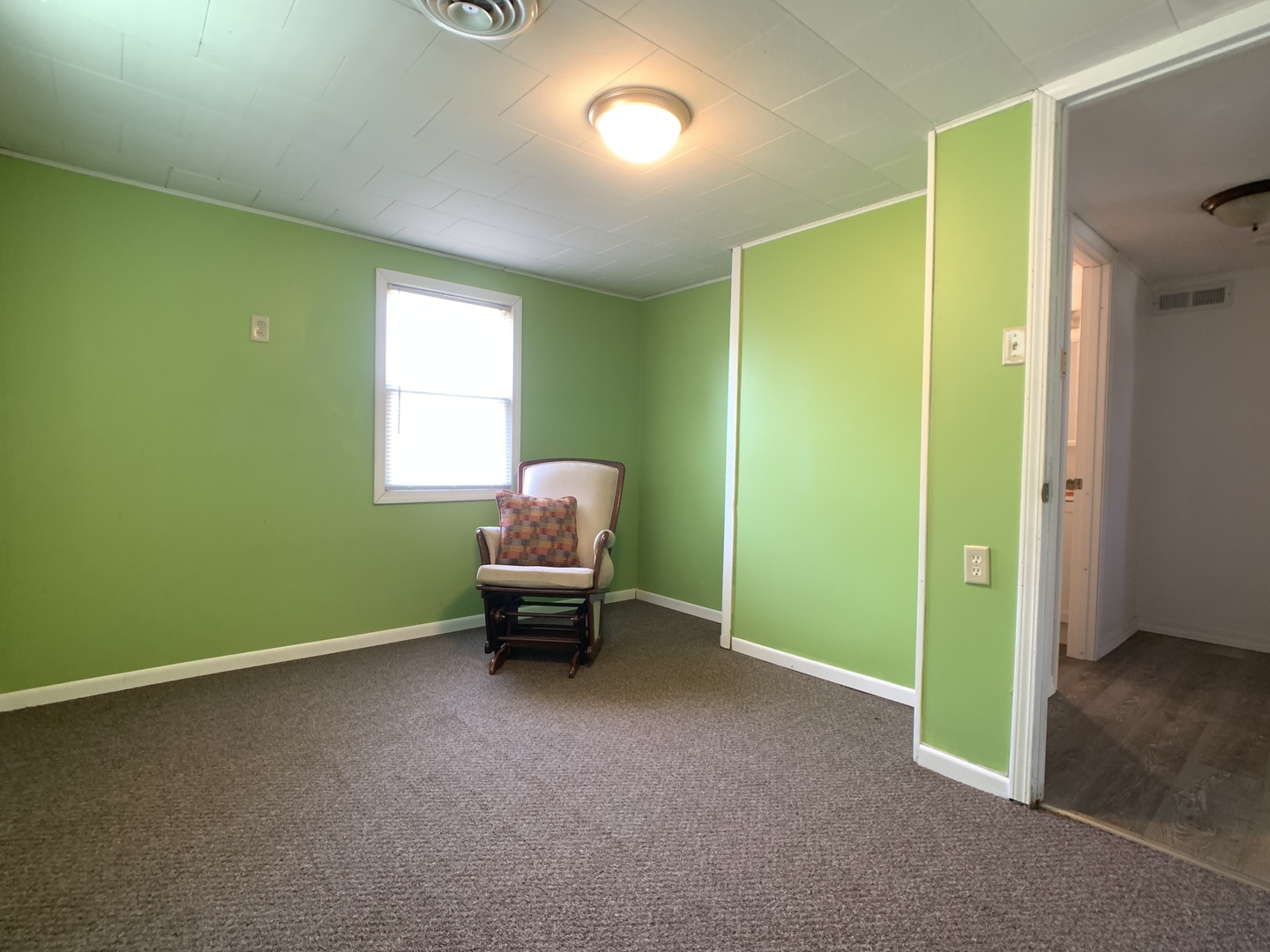 205 West 7th Street Spring Valley, IL 61362 - Photo 29 of 34 a view of a room with window chandelier fan and windows