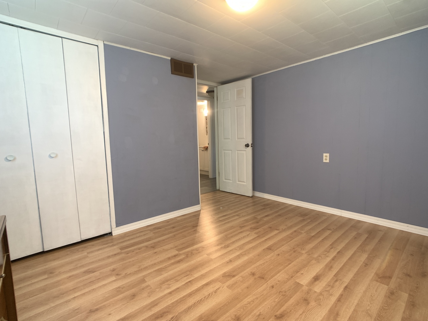205 West 7th Street Spring Valley, IL 61362 - Photo 31 of 34 a view of an empty room with wooden floor