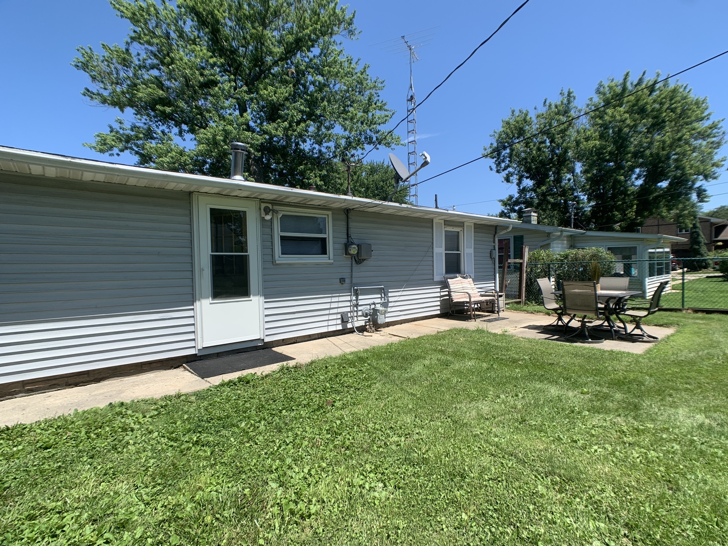 205 West 7th Street Spring Valley, IL 61362 - Photo 5 of 34 a backyard of a house with table and chairs