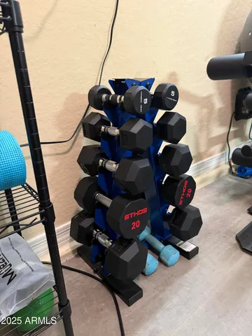 a en suite bathroom with a double vanity sink and a large mirror